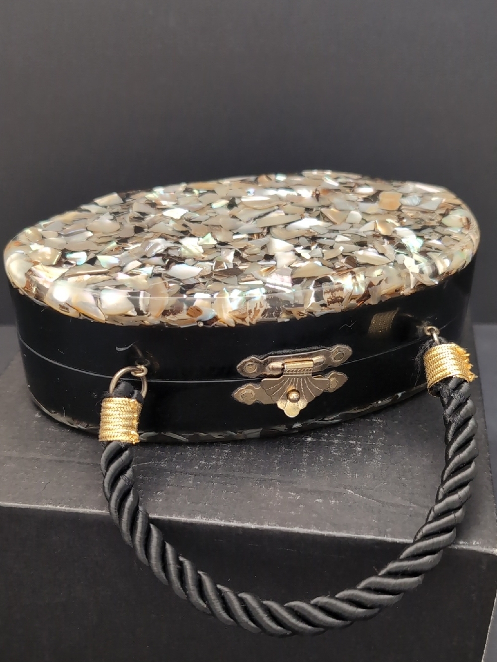 VGT,Art Deco Oval Confetti Clutch with A Bakelite Case And A Rope Handle.